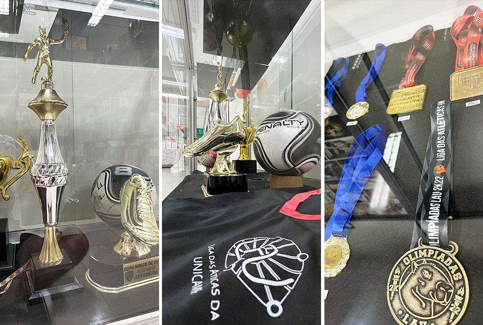 Troféus, bandeiras, medalhas e vários objetos compõem a exposição sobre a trajetória da Liga das Atléticas fundada em 1970